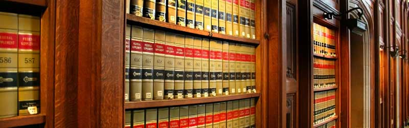 Shelves full of Legal books Legal Services